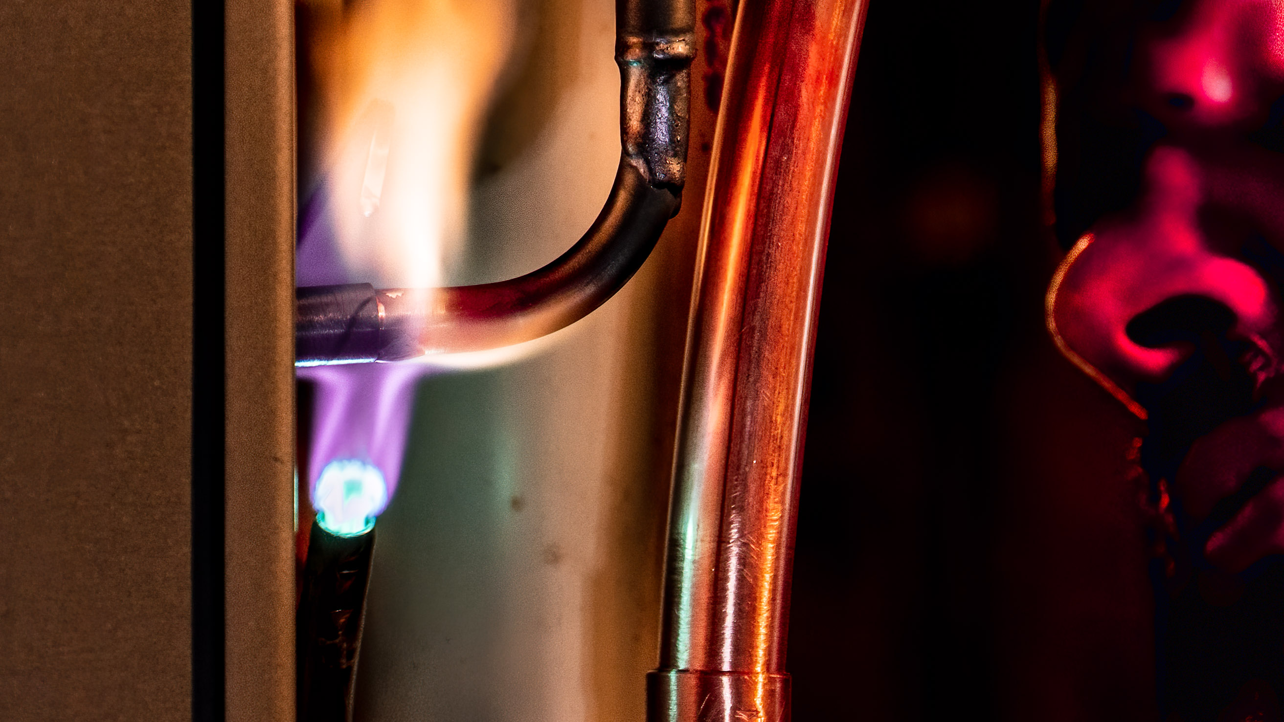 HVAC Services: Technician Installing Copper Lines to Residential Unit (Bourque Mechanical Services) hvac installation -bourque mechanical-trade services photography-glenmont-ny